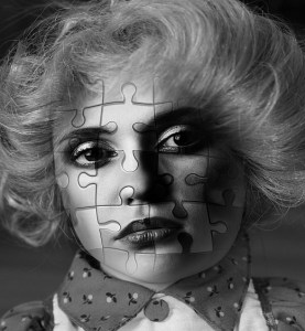 a woman's face divided into a puzzle symbolizing genetic engineering